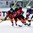 ZUG, SWITZERLAND - APRIL 25: Canada's Mitchell Stephens #23 skates with the puck while USA's Joseph Masonius #2 chases him down and Nicolas Roy #11 looks on during semifinal round action at the 2015 IIHF Ice Hockey U18 World Championship. (Photo by Matt Zambonin/HHOF-IIHF Images)

